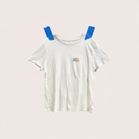 a white t - shirt with blue tape on it